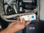 Nikon camera with single lens and flash and flash charger