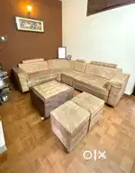 L shape 6 seater sofa set with 2 puffies & centre table