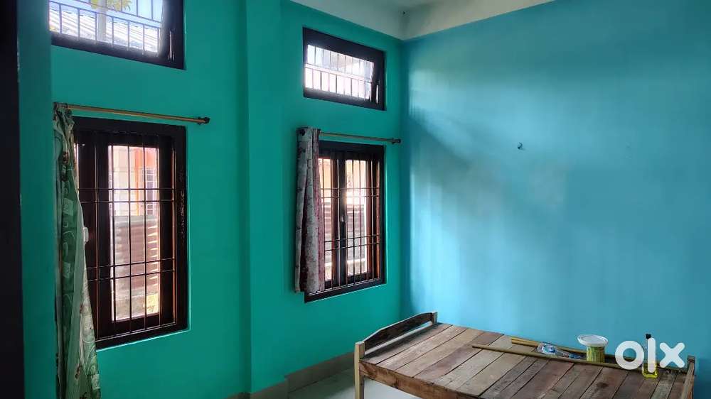 Two rooms with attached bathroom and kitchen along with bike parking