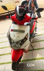 Dio scooty red and white