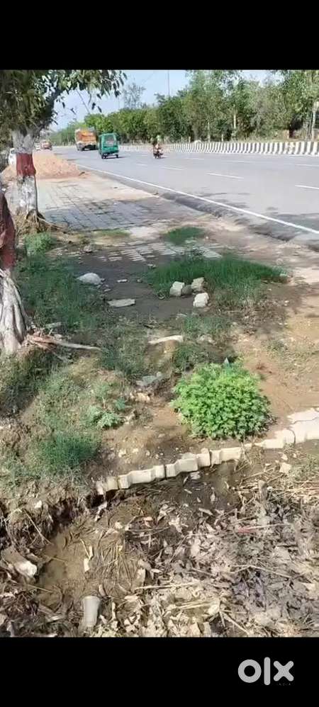 14000sqft plot for sale , on highway , at rate of 6500 / sqft