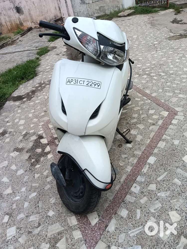 HONDA ACTIVA (WHITE) LESS USED, FANCY NUMBER, NEW TYRES, GOOD MILAGE,.