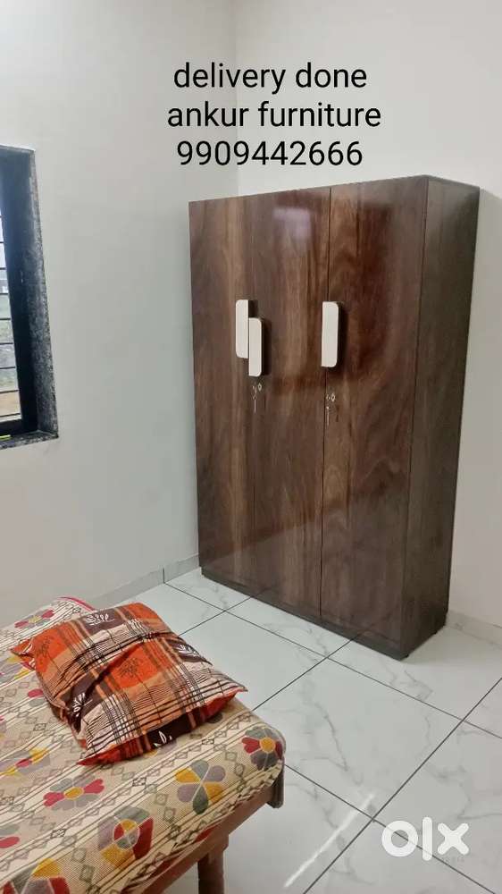 New valsad three door wardrobe