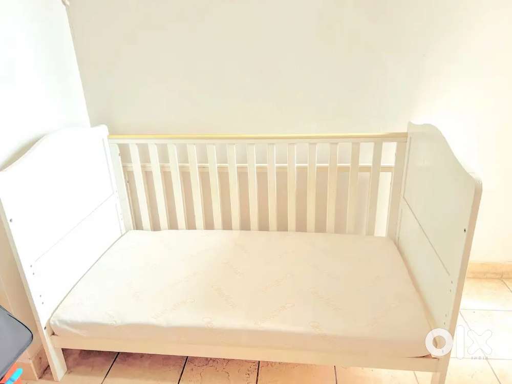 Kids bed and diaper table  in excellent condition