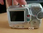 Canon A470 & Olympus FE-100 Camera.