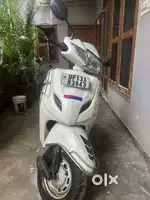 White Color, 60Kmpl mileage, Original Documents, Insurance covered