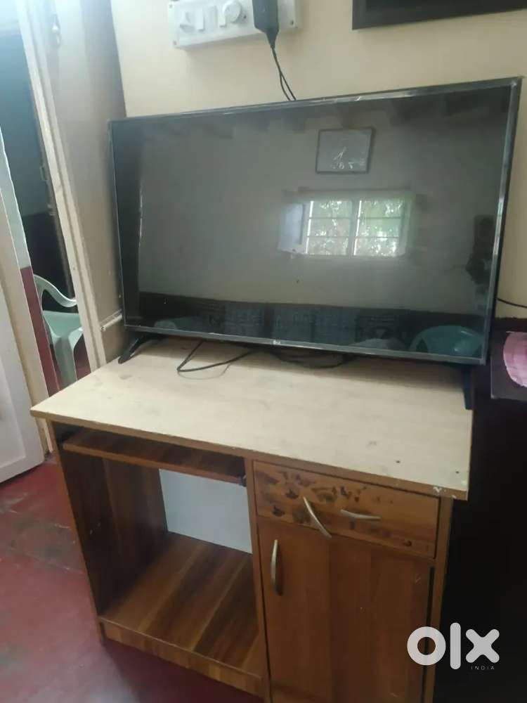 LG 43 inches TV with table and stabilizer