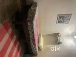 6 ft x 5 ft wooden bed