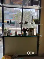 Aluminium frame glasses door and shop counter wood