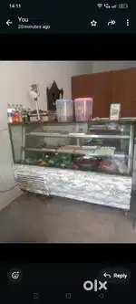 Sweet counter fridge and pizza owen New