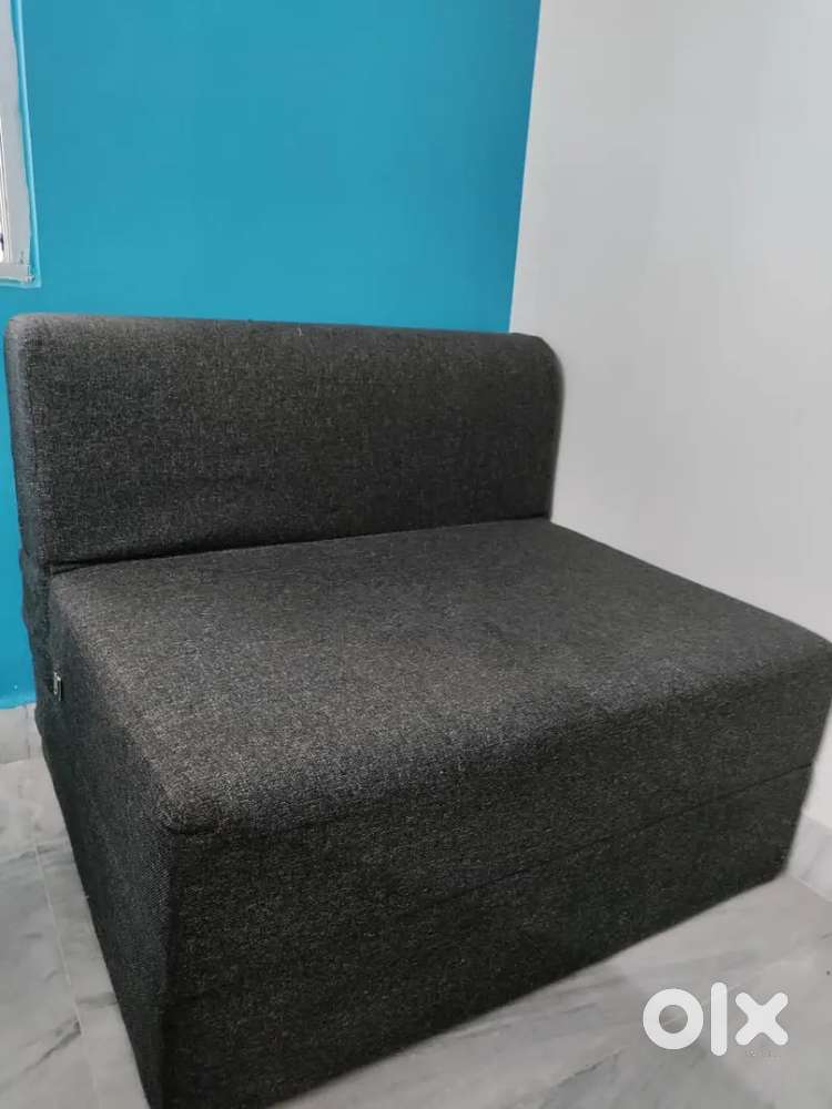 One Seater Sofa cum bed.  New Condition.