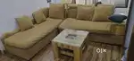 L shape sofa with center table