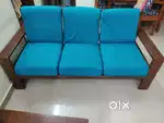 5 seater Teak Wood sofa with cushion in excellent condition.