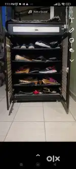 Shoe rack with drawer and shelves