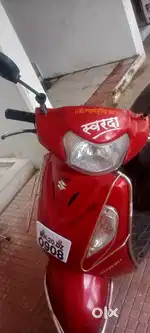 Suzuki Access 125 avaible for sale in red colour.
