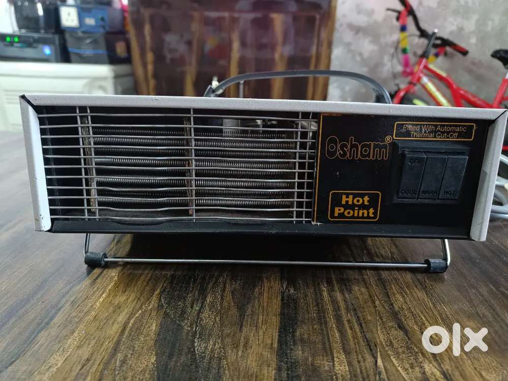 Room Heater (Blow hot fan room heater)