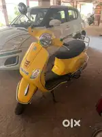 Vespa Yellow Vehicle