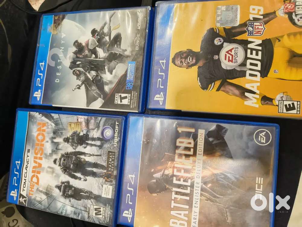 PS4 SLIM 1TB WITH 4 GAMES