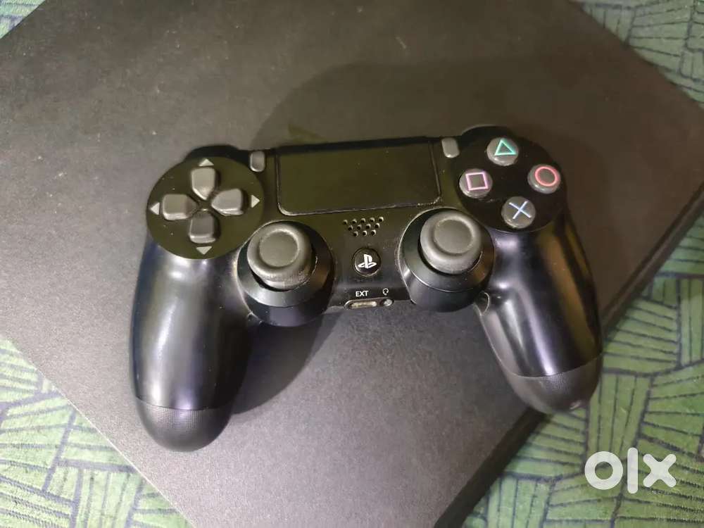 PS4 Slim 1tb with 7 games (original ps4 power cable included)