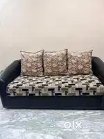 Three seater sofa and centre table