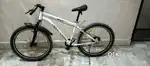 MTB cycle with dual disk brakes and front suspension