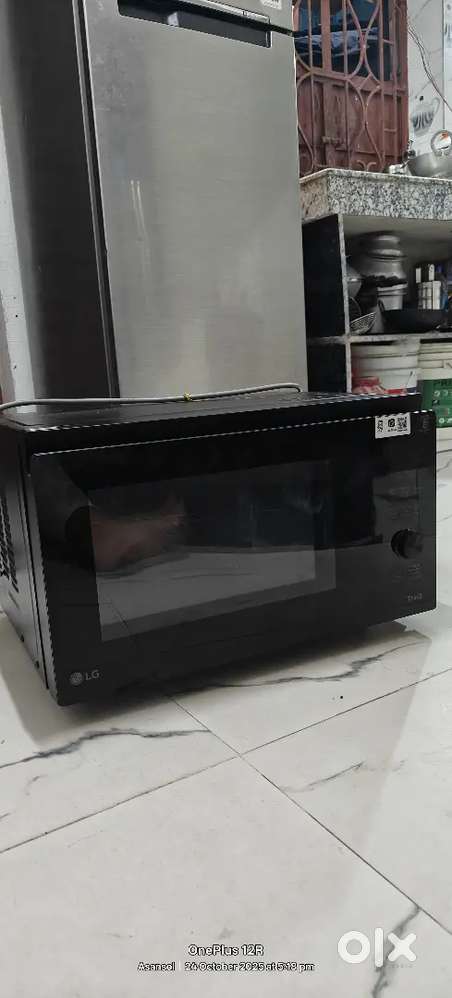 LG 32L Charcoal convection microwave with WIFI Support under warnty 2y
