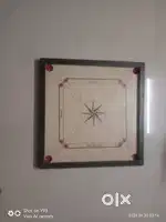 Brand new carrom board like good condition price is 600