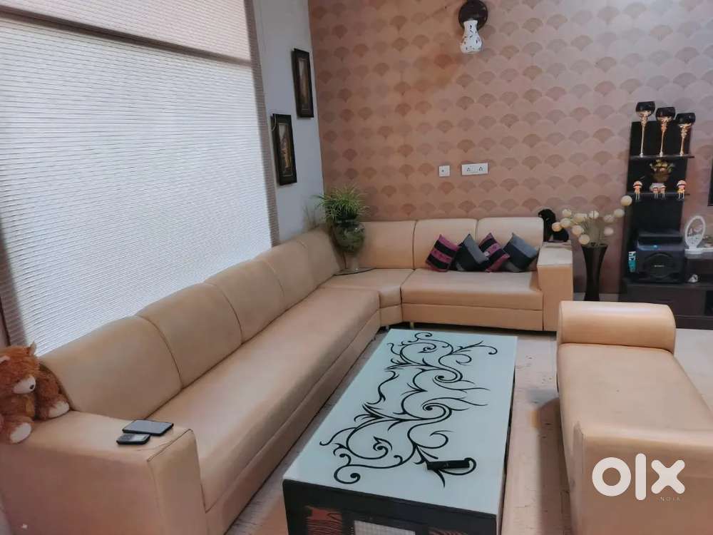 10 seated L- shape Leather sofa with table