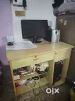 Computer with table and speaker
