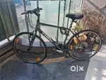 Trek FX1 Grey color wigh Shimano 7*3 gears. 2019 model with bill.