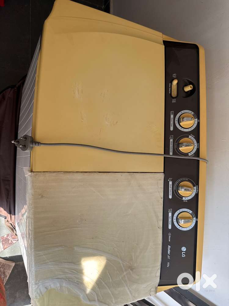 Manually operated and white in colour.