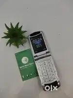 VERTU FLIP MOBILE - NEXT TO NEW LIKE CONDITION MOBILE WITH BILL.