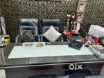 One   Office table and 2  Boss type chairs