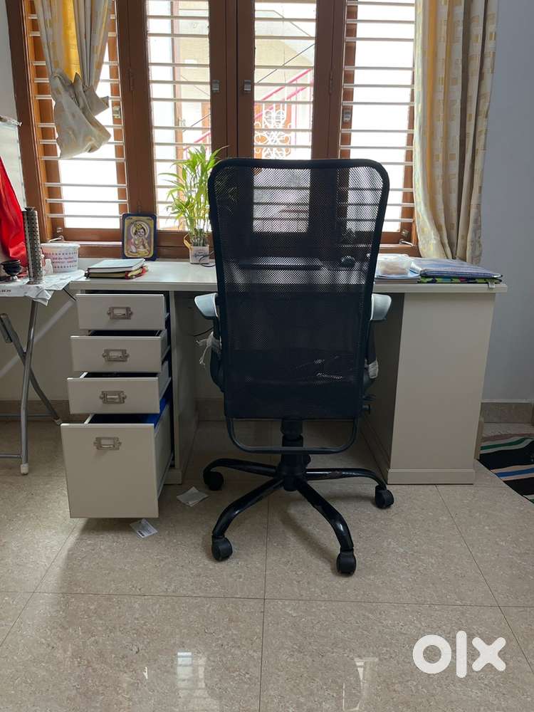 Office desk with adjustable chair