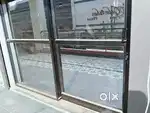 Double hight shop on 1st floor with aluminium section door