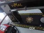 Setiching  machine.   Is new