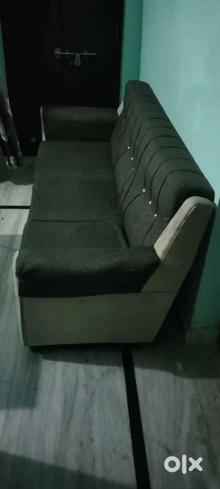 Sofa with table with glass