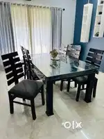8 seater wooden dining table and 6 wooden chairs for sale