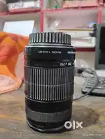 Canon camera leans 55-250