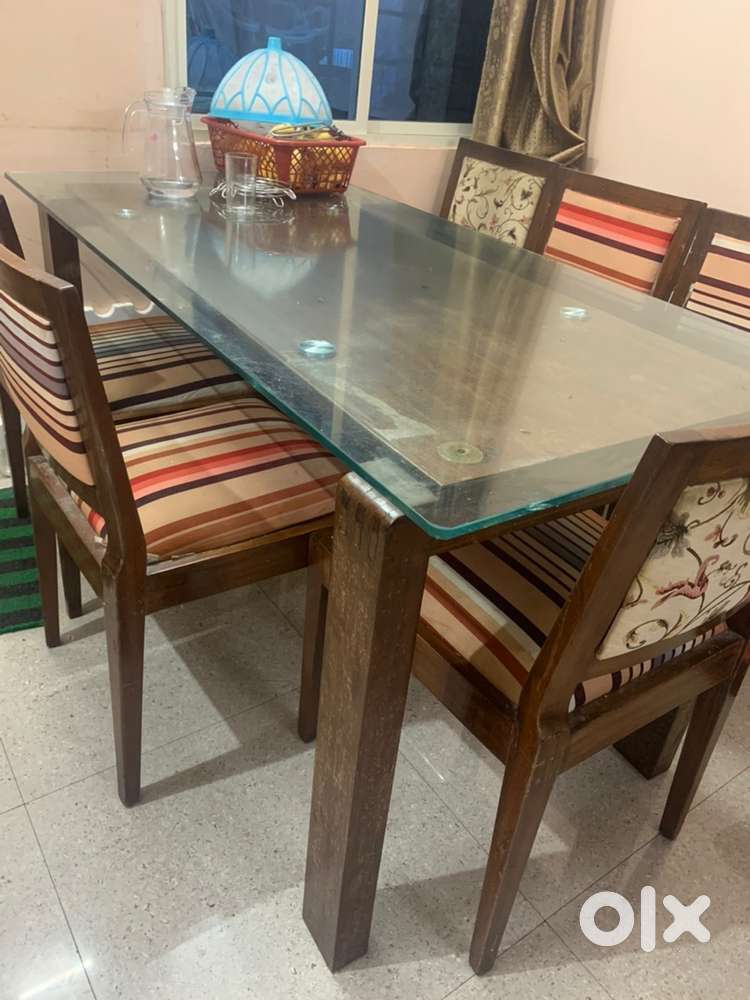 Teak wood sofa, teak wood dinning table and showcase