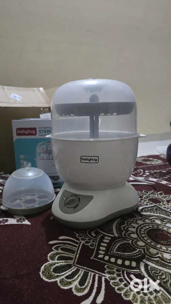 Baby hug sterlizer 6 in 1 brand new with warranty