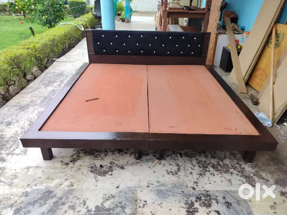 Wooden new designer double bed without storage availablei