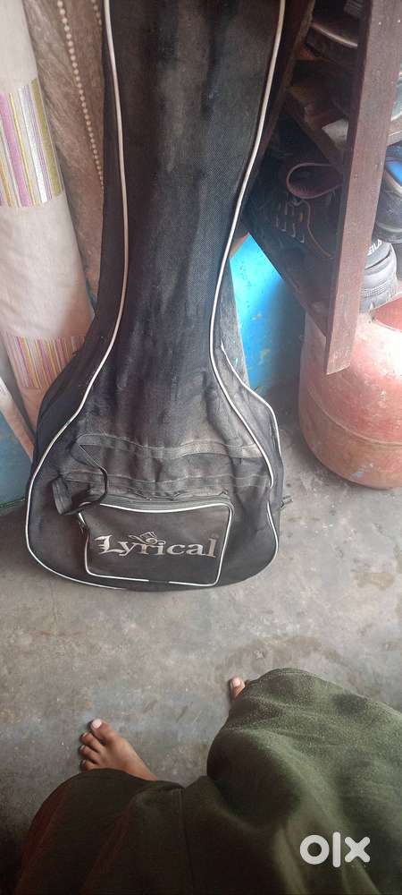 Lyrical company jumbo size guitar with chip