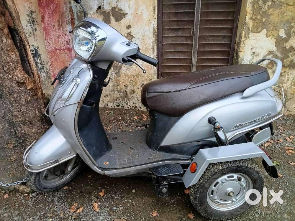 Suzuki access with new side wheel connected