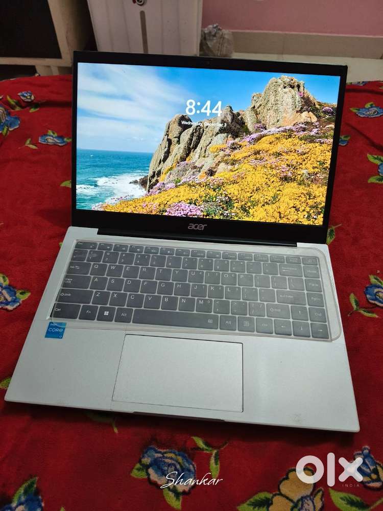 Laptop, charger, mouse