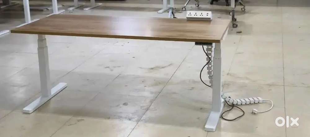 Teknion brand electric automatic height adjustable table