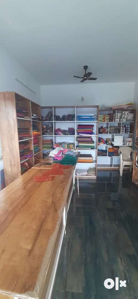 Shop for sale.(textile and tailoring materials, and racks, tables