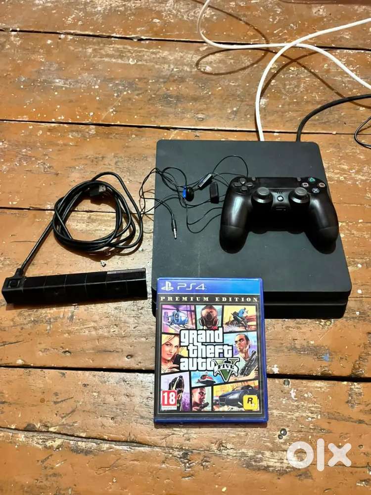 PS4 Slim – Excellent Condition + Original Controller