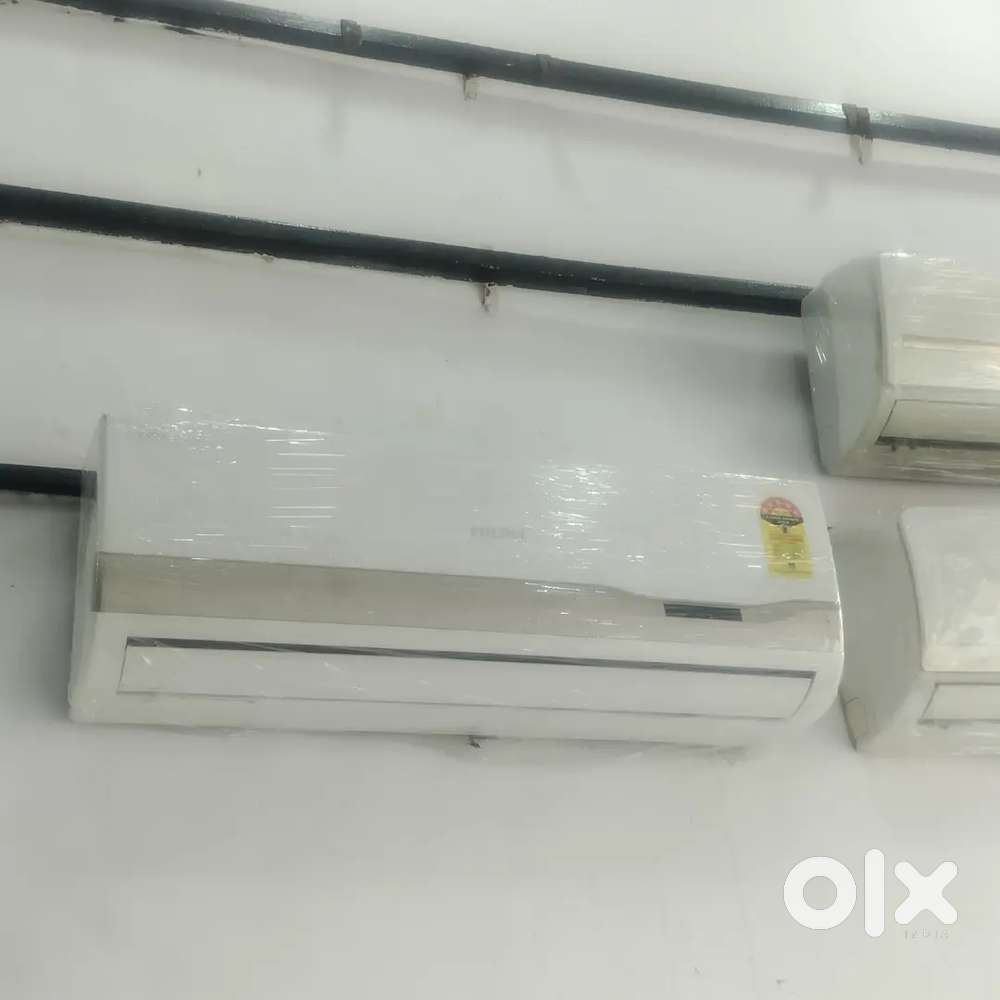 Voltas 1.5 ton split AC good condition with warranty 1 year old