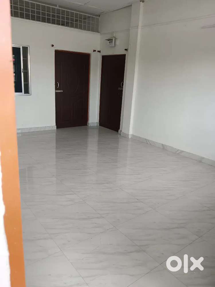 Room with attached bathroom and kitchen